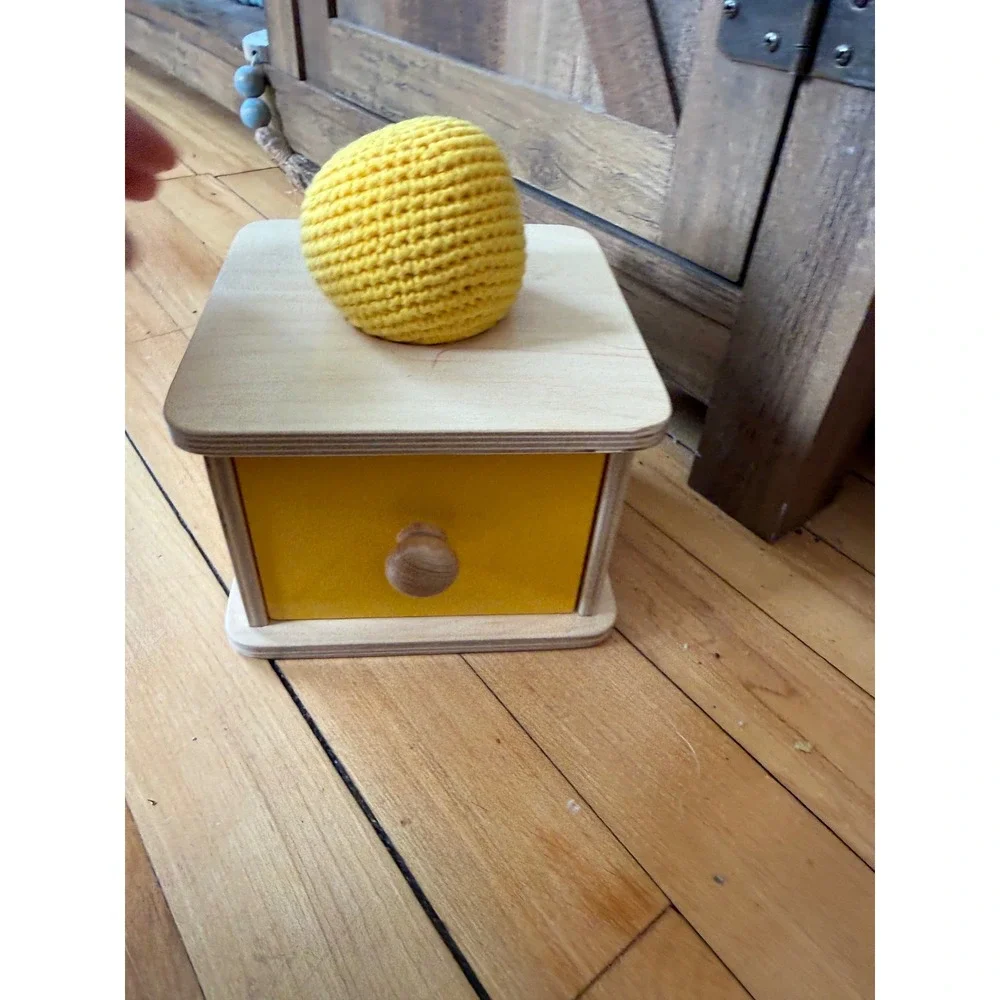 Monti Kids motor planning wooden yellow‎ box with drawer and yellow knit ball